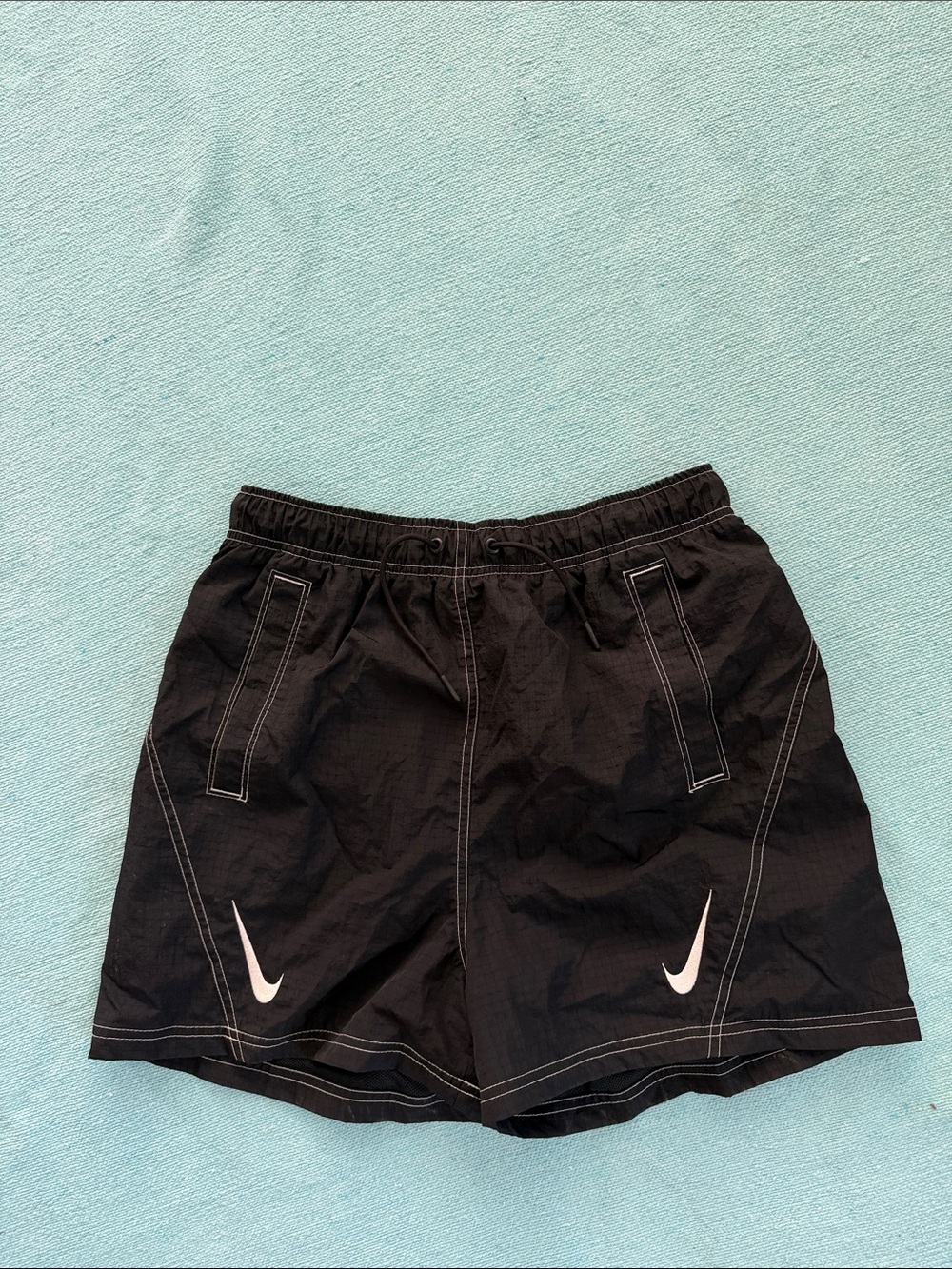 Nike Black Athletic Shorts with White Swoosh Accents S